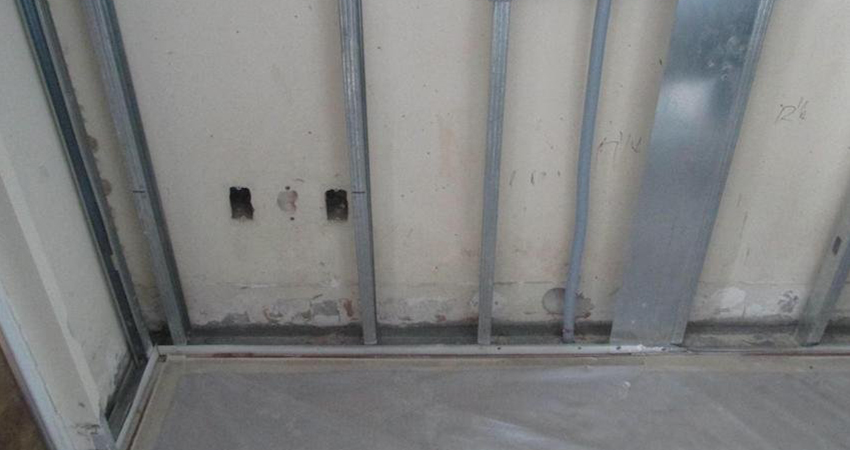 tropical hotel mold problems in conventional drywall framed walls